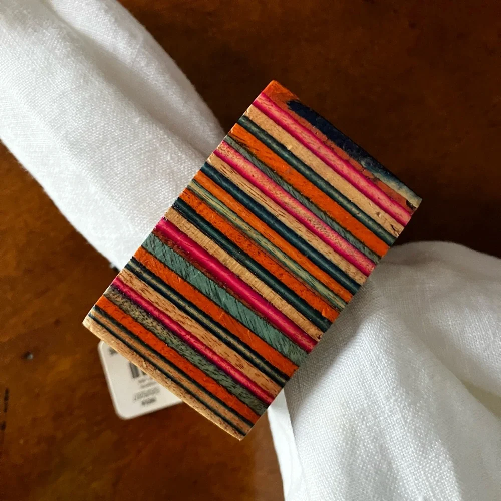 Set of 8 Multicolored Striped Wooden Napkin Rings. Napkin is not included.